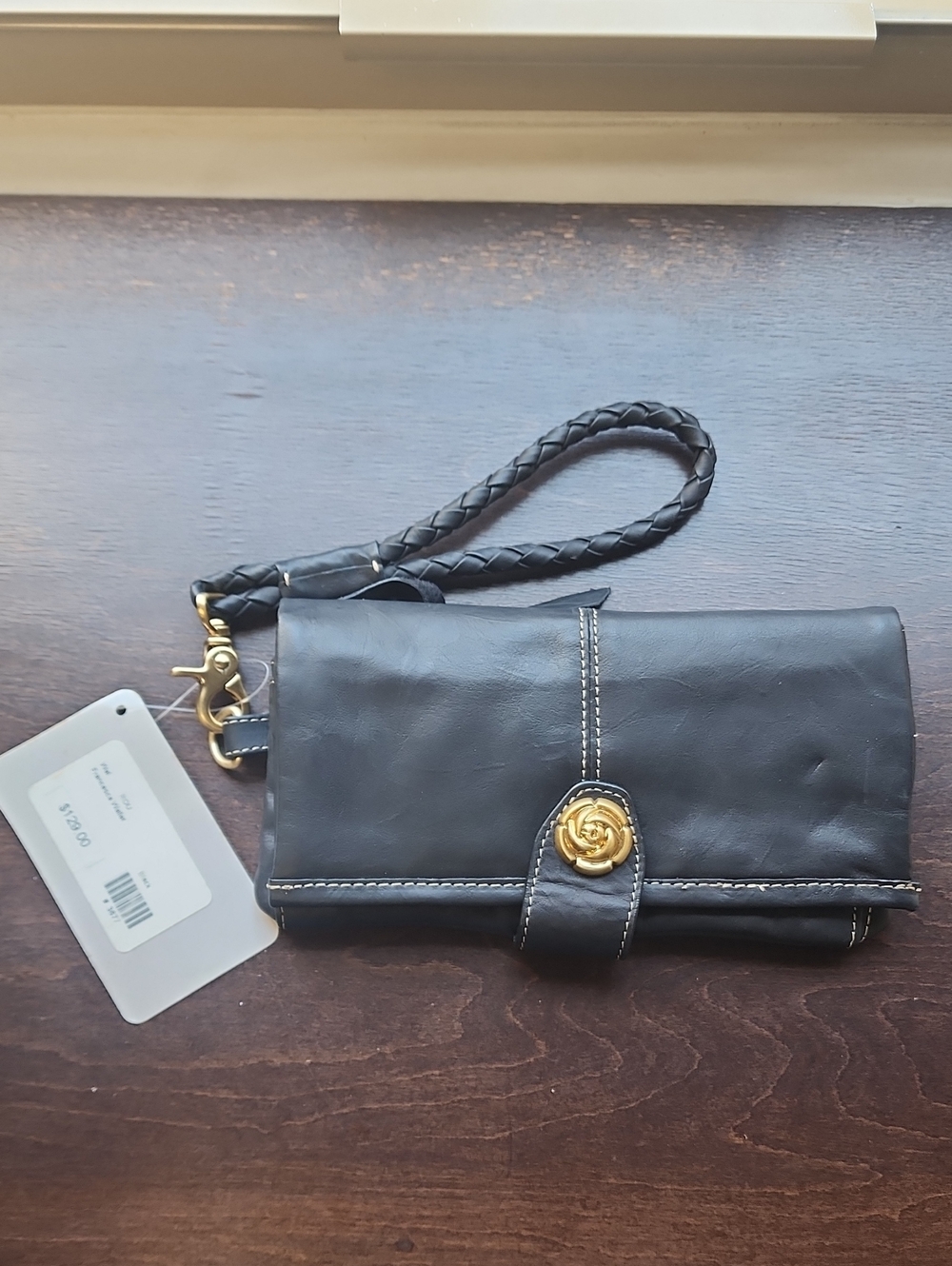 Black Leather Wristlet Clutch with Gold Flower Stud Accent